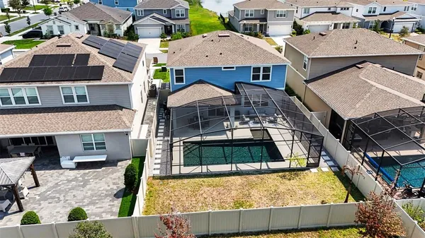 a aerial view of a house with entertaining space