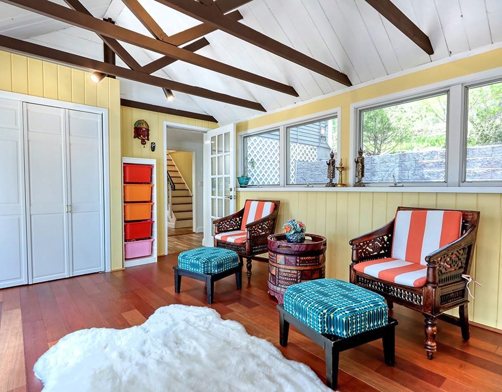 11 Juniper Ridge Road Lincoln, MA 01773 - Photo 12 of 36 a living room with furniture and a wooden floor