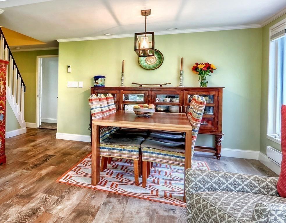 11 Juniper Ridge Road Lincoln, MA 01773 - Photo 13 of 36 a living room with furniture and a wooden floor
