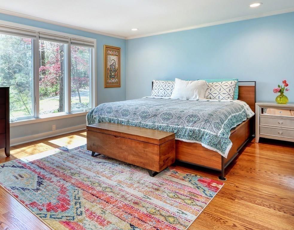 11 Juniper Ridge Road Lincoln, MA 01773 - Photo 16 of 36 a bedroom with a bed and window