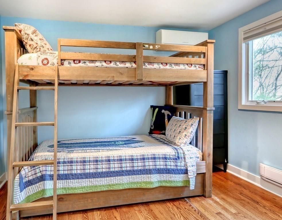 11 Juniper Ridge Road Lincoln, MA 01773 - Photo 22 of 36 a bedroom with a bed and window