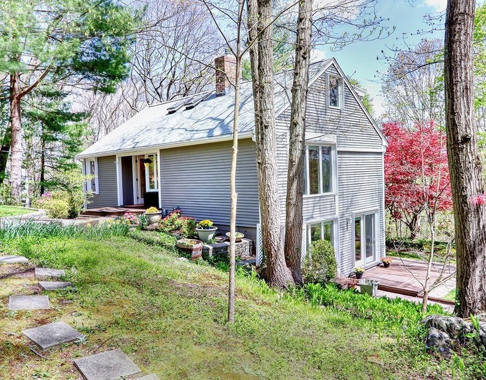 11 Juniper Ridge Road Lincoln, MA 01773 - Photo 30 of 36 front view of a house with a yard