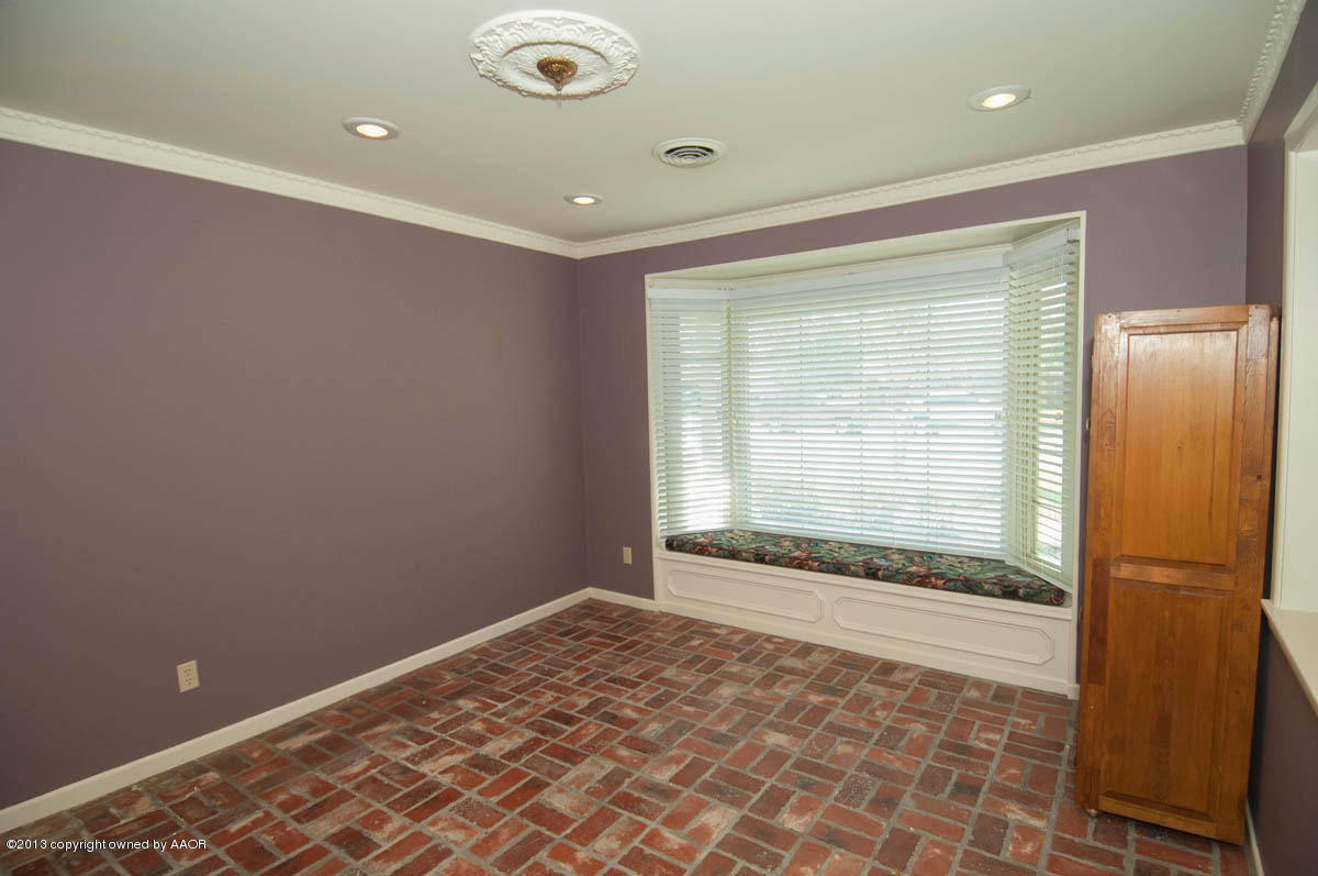 6206 Calumet Road Amarillo, TX 79106 - Photo 18 of 47 a view of an empty room with a window