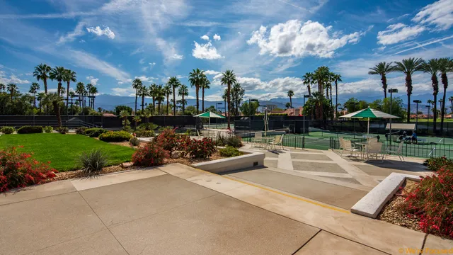 a view of a terrace with sitting area