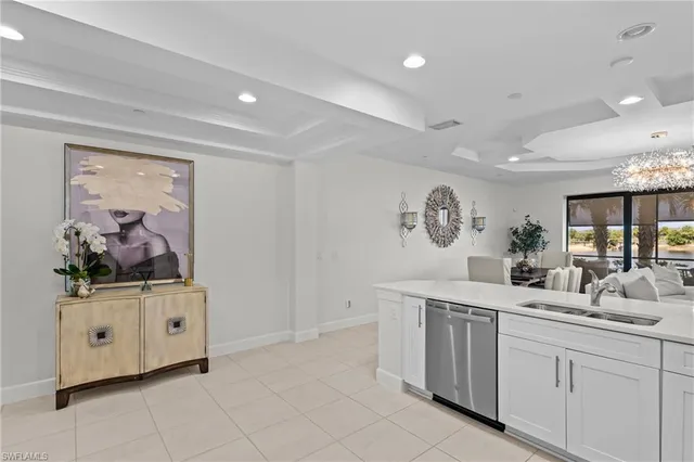 a room with a sink and a mirror