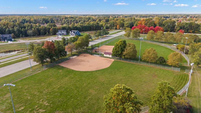 a view of a swimming pool and an outdoor seating