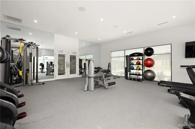 a view of house with a yard