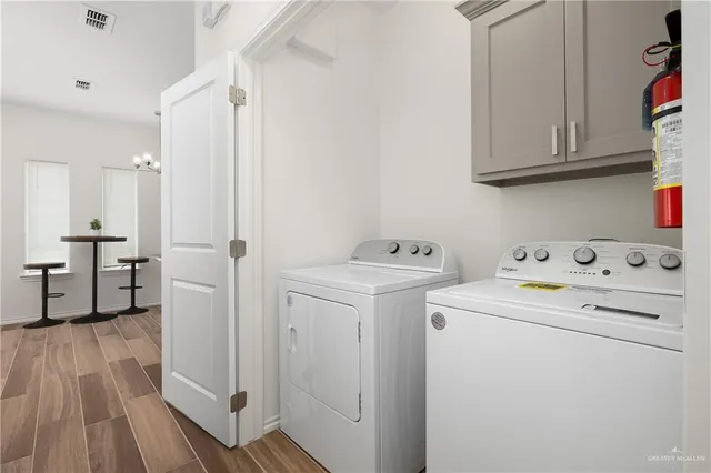 a bedroom with a bed and a table in it