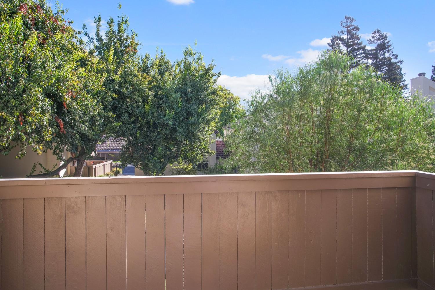 3701 Colonial Drive, Unit 156 Modesto, CA 95356 - Photo 25 of 32 a view of a fence from a window