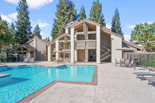 a house view with a sitting space and garden space