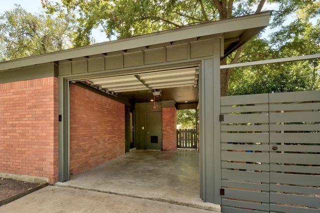 a view of a car park in front of a building