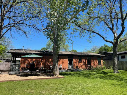 a view of a chairs in front of house