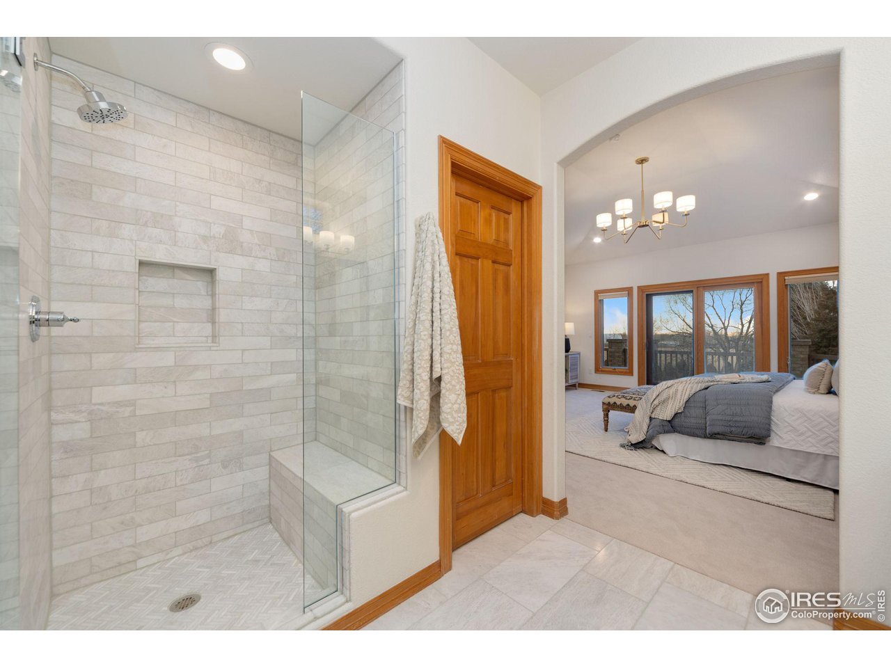 7930 Eagle Ranch Road Fort Collins, CO 80528 - Photo 17 of 40 a living room with furniture and a large window
