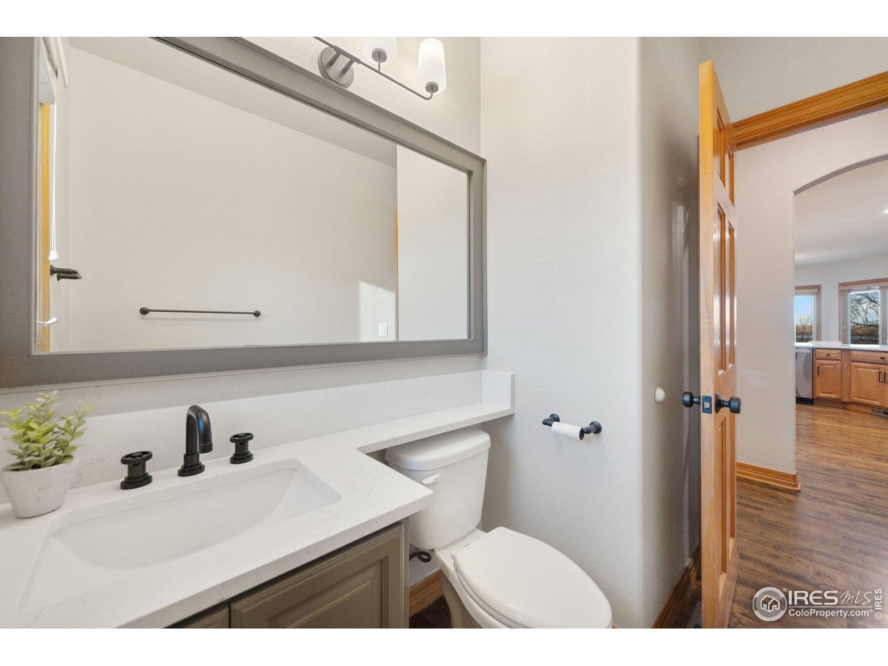 7930 Eagle Ranch Road Fort Collins, CO 80528 - Photo 18 of 40 a bathroom with a sink vanity and a mirror