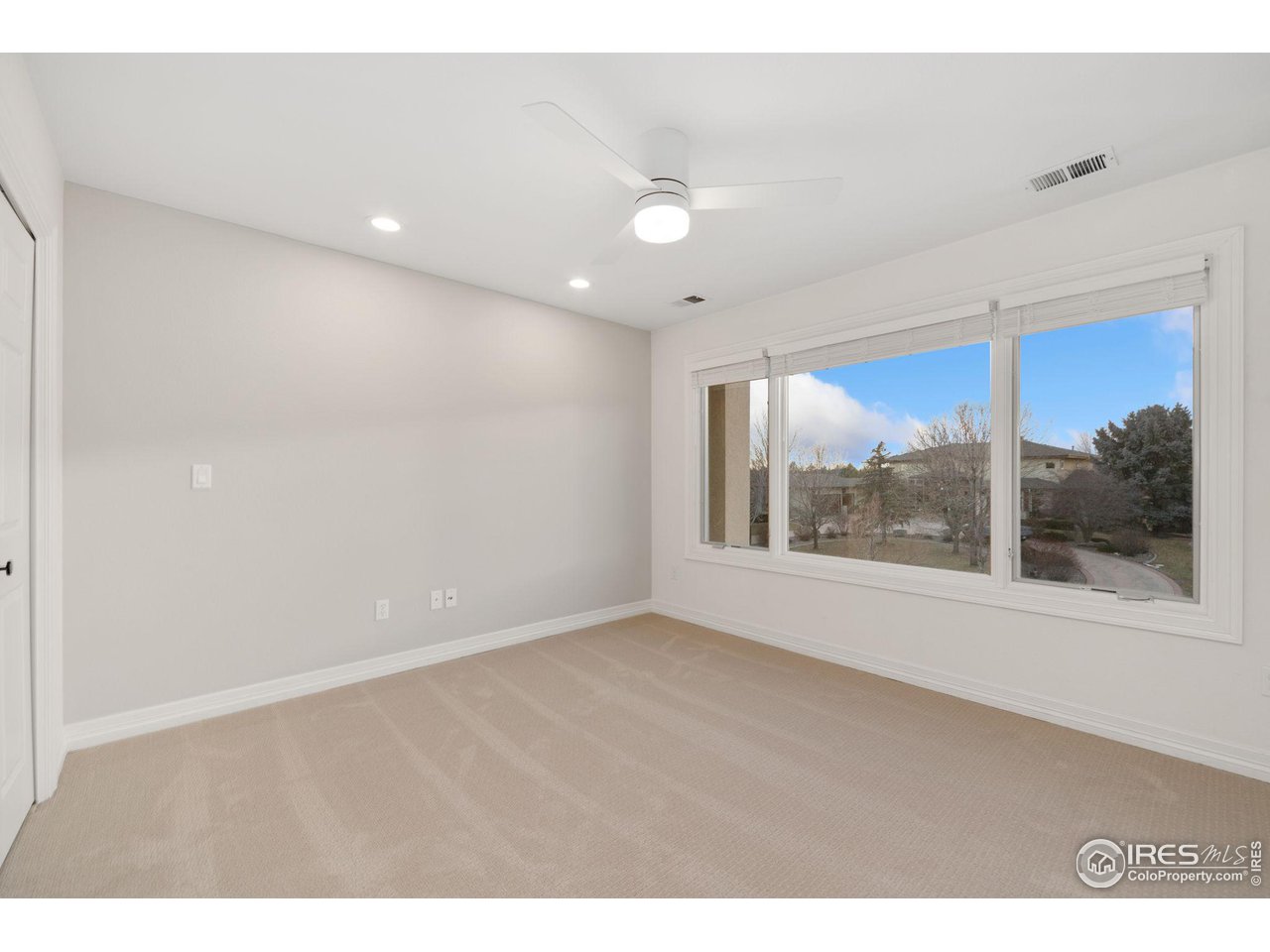 7930 Eagle Ranch Road Fort Collins, CO 80528 - Photo 23 of 40 a view of an empty room with a window