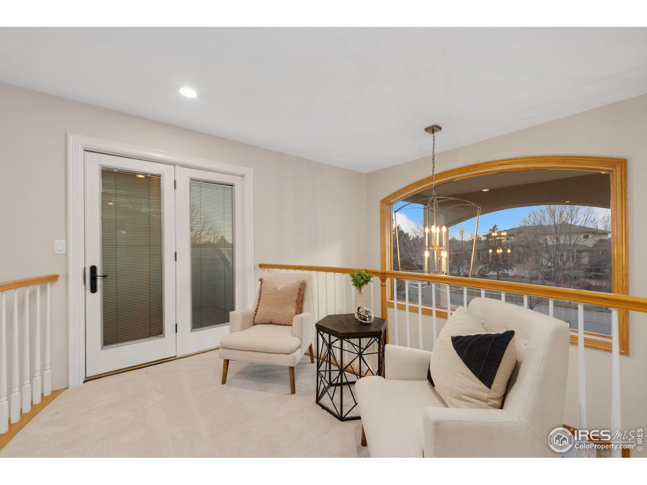 7930 Eagle Ranch Road Fort Collins, CO 80528 - Photo 25 of 40 a living room with furniture and a window