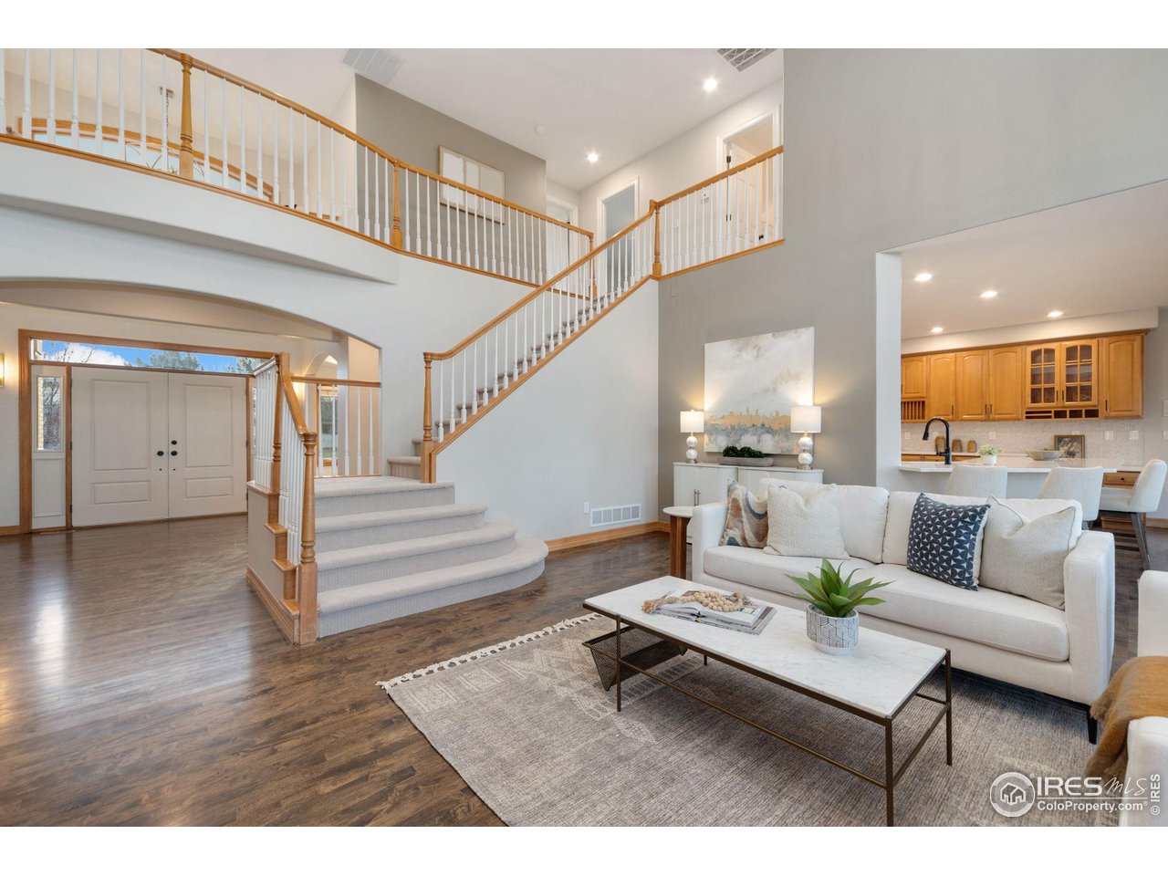 7930 Eagle Ranch Road Fort Collins, CO 80528 - Photo 5 of 40 a living room with furniture and a wooden floor