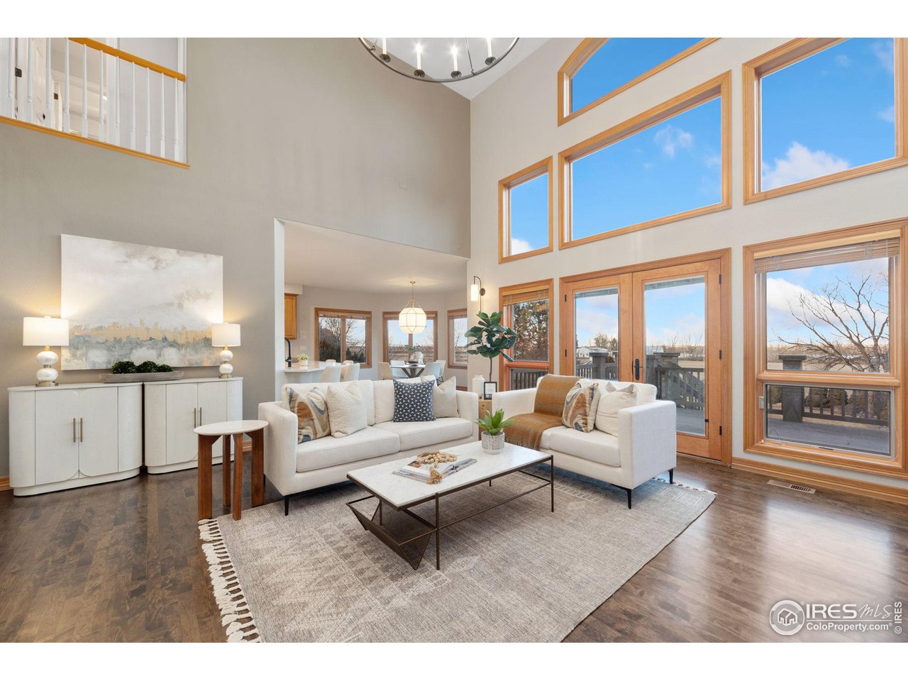 7930 Eagle Ranch Road Fort Collins, CO 80528 - Photo 6 of 40 a living room with furniture and a large window