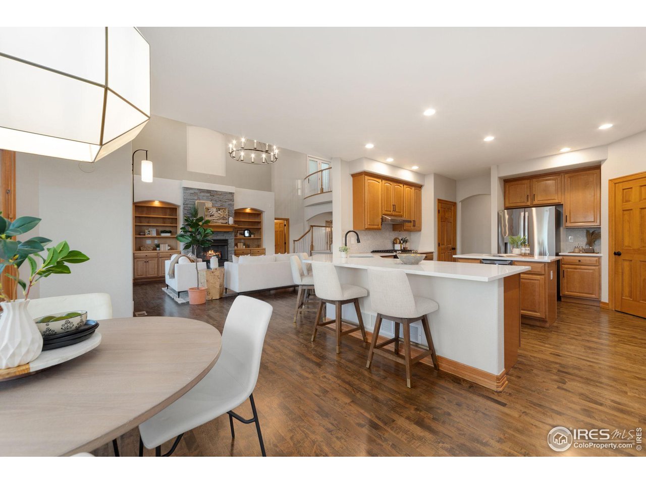 7930 Eagle Ranch Road Fort Collins, CO 80528 - Photo 8 of 40 a living room with furniture and kitchen view