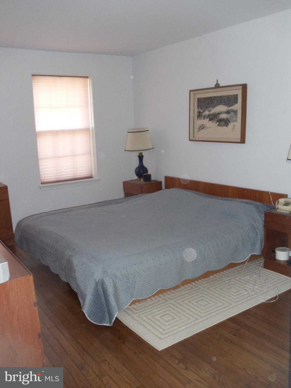 2186 Golf Course Drive Reston, VA 20191 - Photo 14 of 30 a bedroom with a bed and window