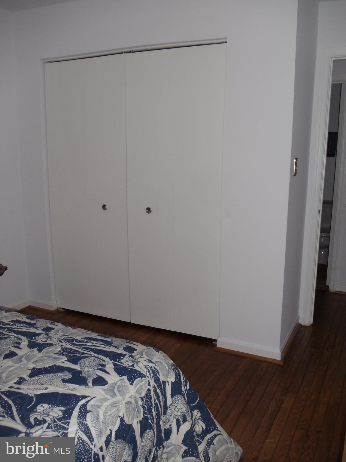 2186 Golf Course Drive Reston, VA 20191 - Photo 18 of 30 a view of a room with wooden floor and closet