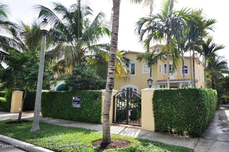 272 Cordova Road West Palm Beach, FL 33401 - Photo 1 of 15 a front view of a house with a yard and potted plants
