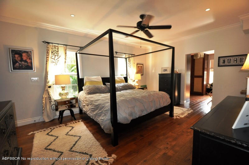 272 Cordova Road West Palm Beach, FL 33401 - Photo 7 of 15 a bedroom with a bed window and a table
