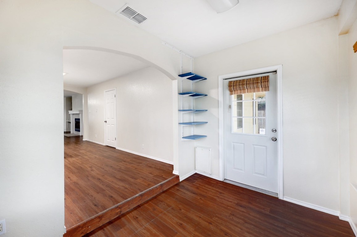 301 Nicole Way Bastrop, TX 78602 - Photo 12 of 23 a view of a room with wooden floor and closet