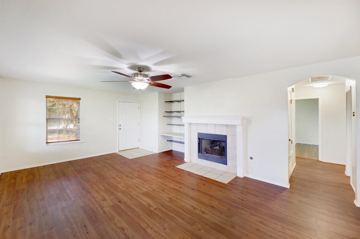 301 Nicole Way Bastrop, TX 78602 - Photo 5 of 23 an empty room with windows and a fireplace