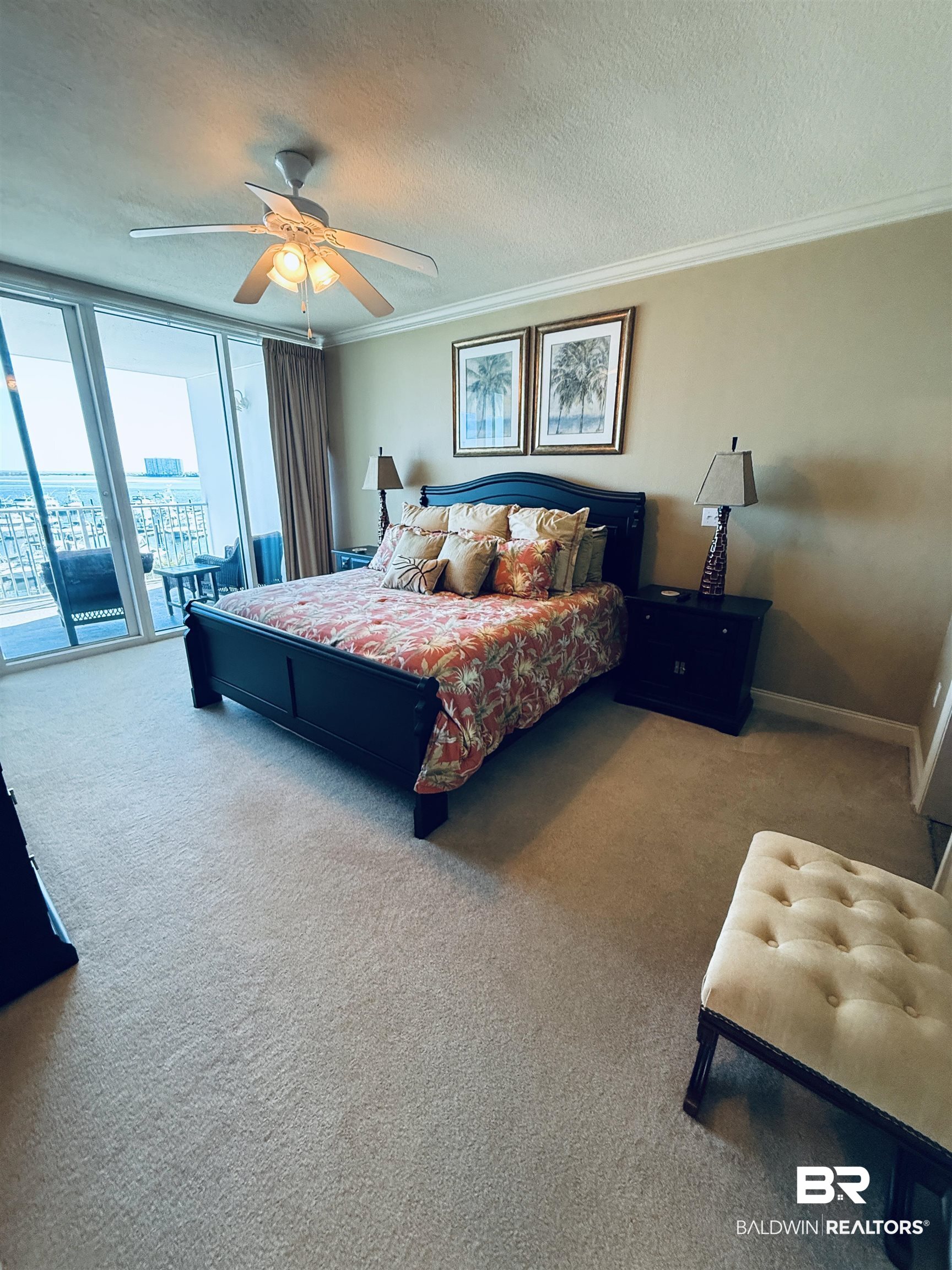 27800 Canal Road, Unit 409 Orange Beach, AL 36561 - Photo 15 of 22 Carpeted bedroom with expansive windows, access to outside, a textured ceiling, ornamental molding, and a ceiling fan
