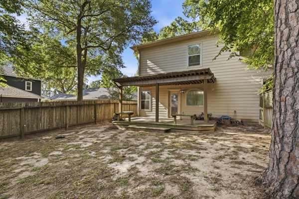 13396 Teel Road Montgomery, TX 77356 - Photo 36 of 50 a front view of a house with a garden
