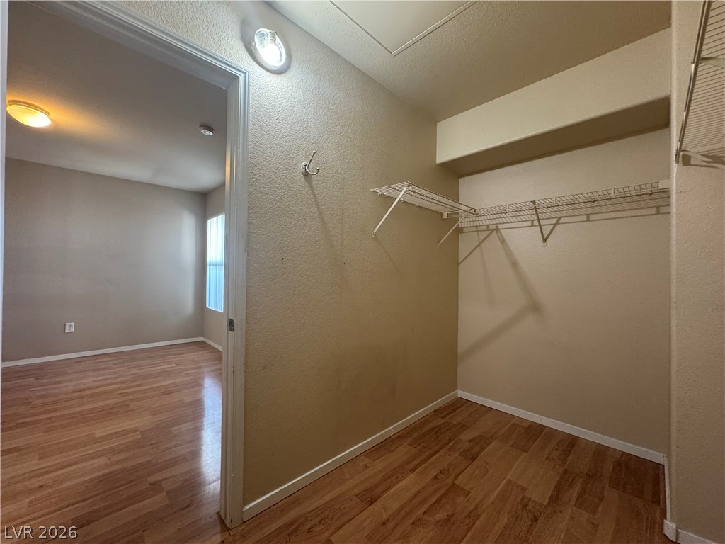 7255 West Sunset Road, Unit 2081 Las Vegas, NV 89113 - Photo 10 of 20 Walk in closet with light wood finished floors