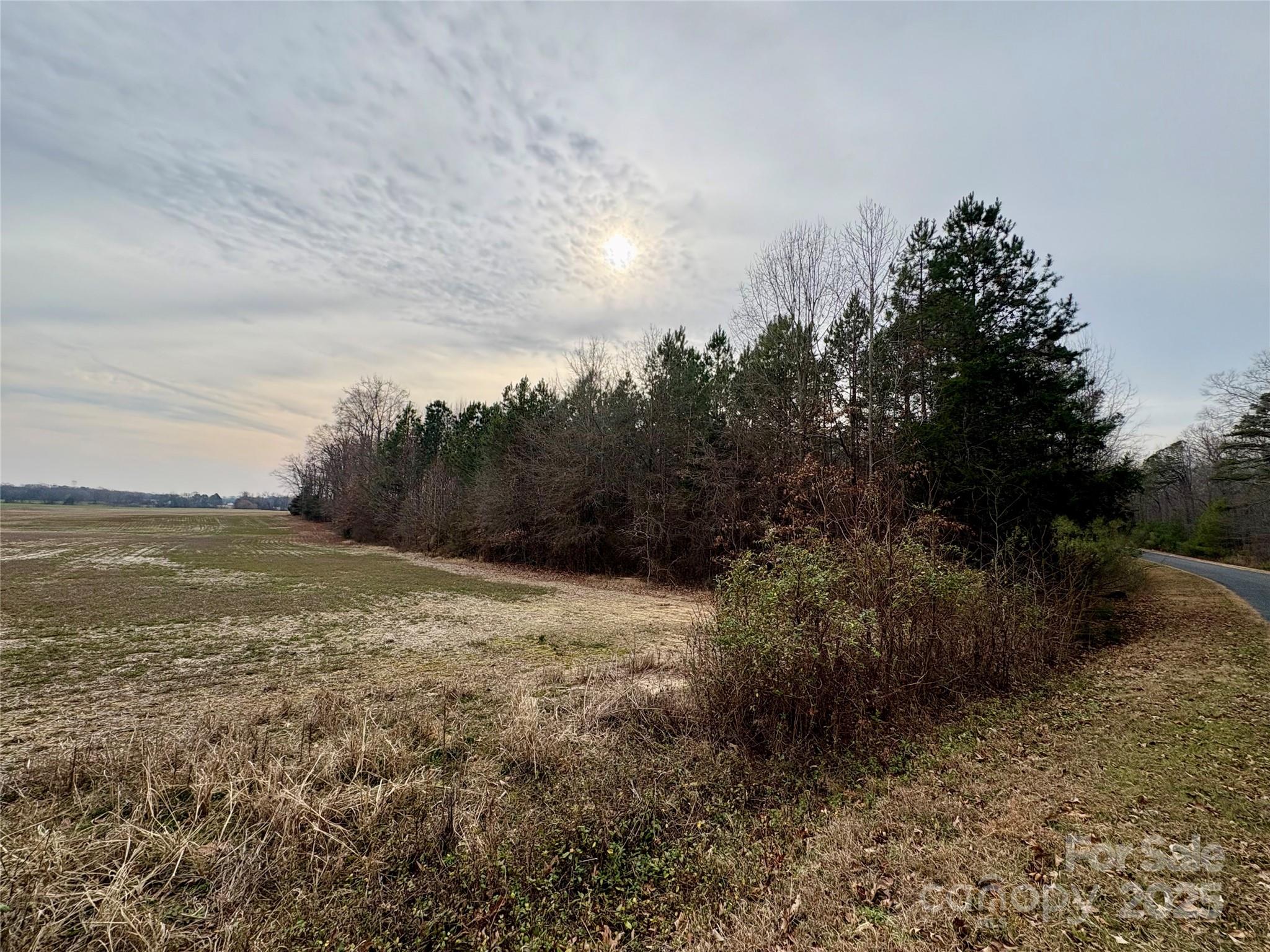 2734 L J Whitley Road Monroe, NC 28112 - Photo 5 of 7 a view of a field with an ocean