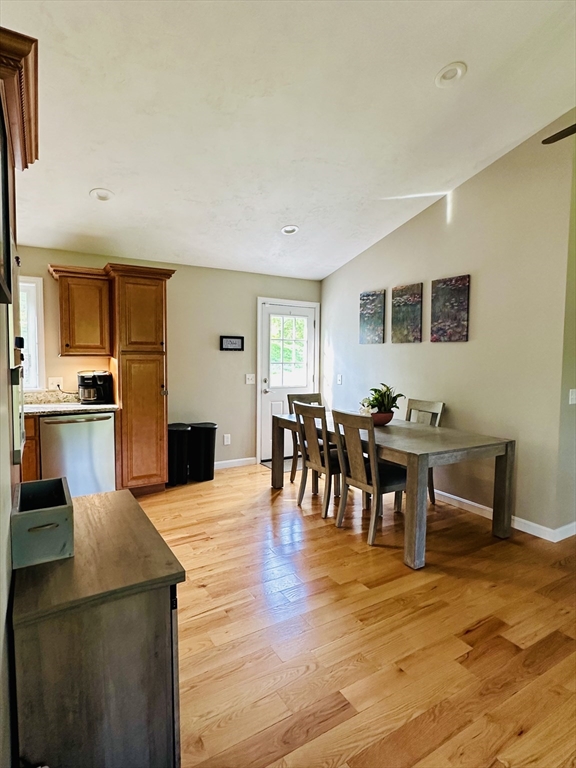24 Dodge Road Charlton, MA 01507 - Photo 12 of 34 a view of a dining room with furniture and a kitchen counter space