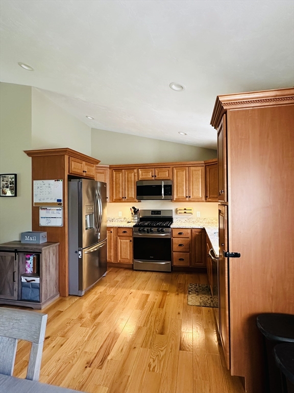 24 Dodge Road Charlton, MA 01507 - Photo 14 of 34 a kitchen with stainless steel appliances a stove and a refrigerator