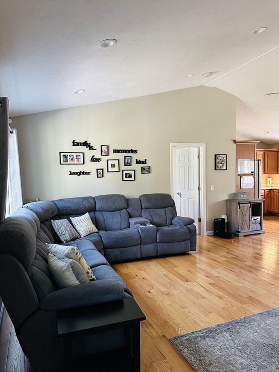 24 Dodge Road Charlton, MA 01507 - Photo 16 of 34 a living room with furniture and kitchen view