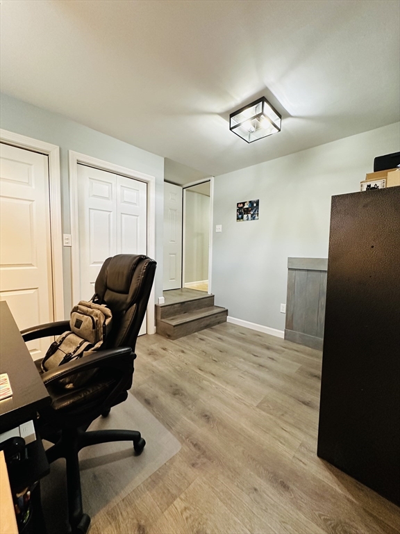 24 Dodge Road Charlton, MA 01507 - Photo 21 of 34 a room with a couch and wooden floor