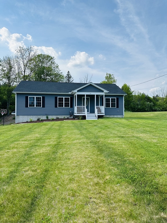 24 Dodge Road Charlton, MA 01507 - Photo 3 of 34 a view of a house with a garden and trees
