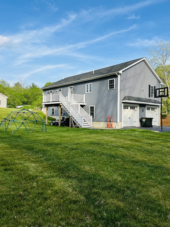 24 Dodge Road Charlton, MA 01507 - Photo 31 of 34 a front view of house with yard and green space