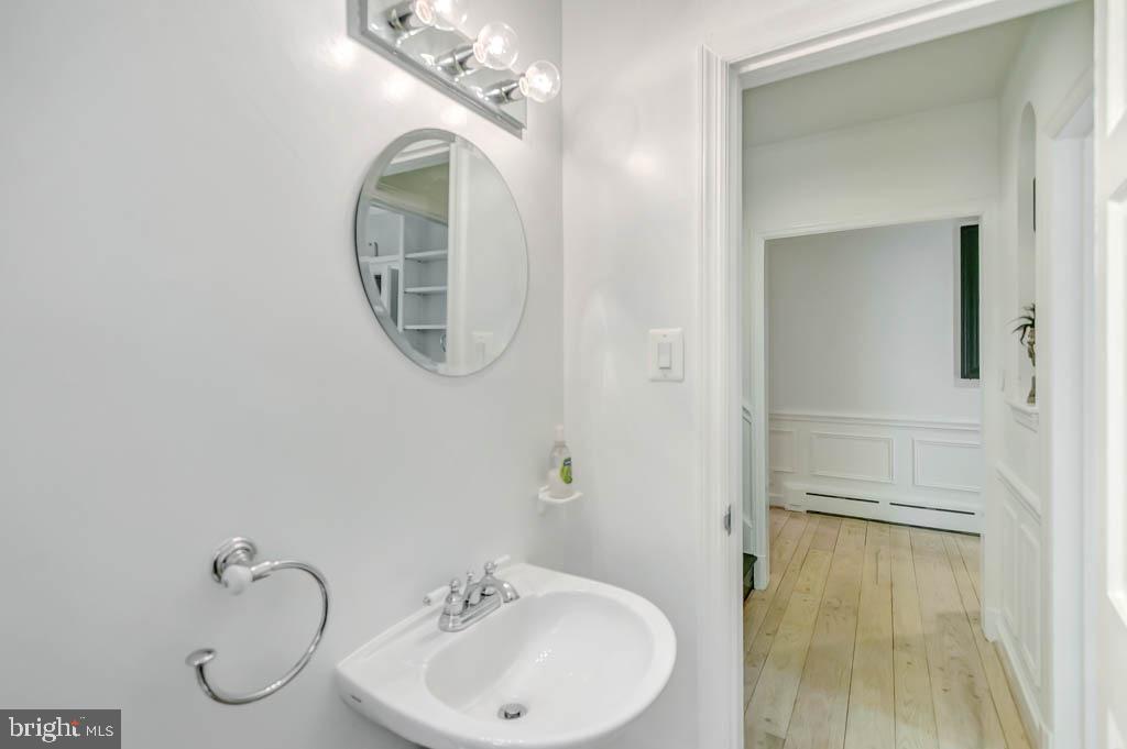 5016 Loughboro Road Northwest Washington, DC 20016 - Photo 4 of 39 Main level powder room