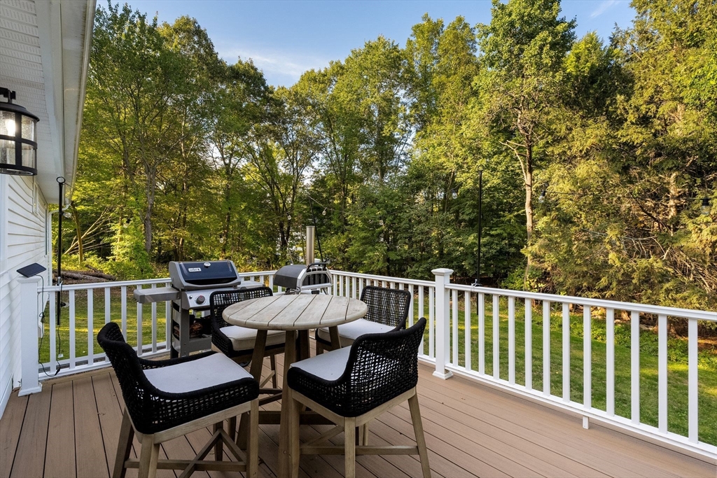 43 Oregon Road Ashland, MA 01721 - Photo 14 of 41 a view of a chair and table in the balcony