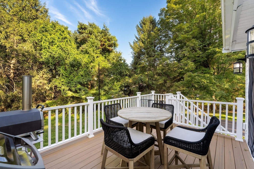43 Oregon Road Ashland, MA 01721 - Photo 15 of 41 a view of a chairs and table on the deck