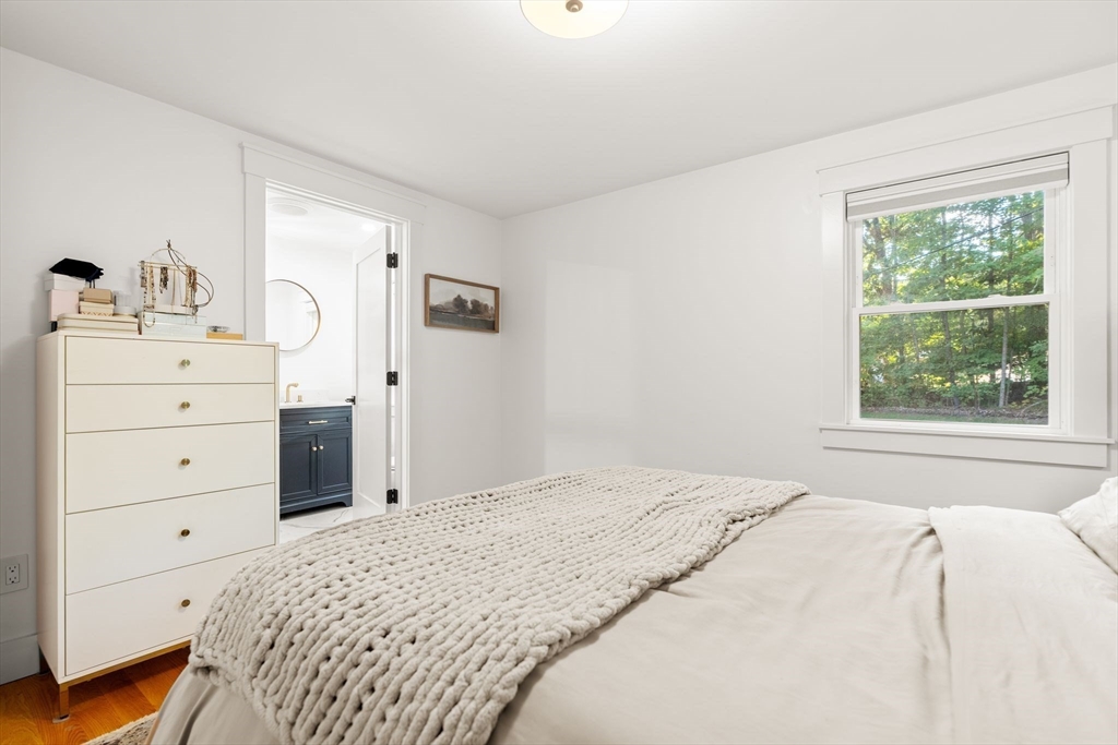 43 Oregon Road Ashland, MA 01721 - Photo 18 of 41 a bedroom with a bed and a window dresser