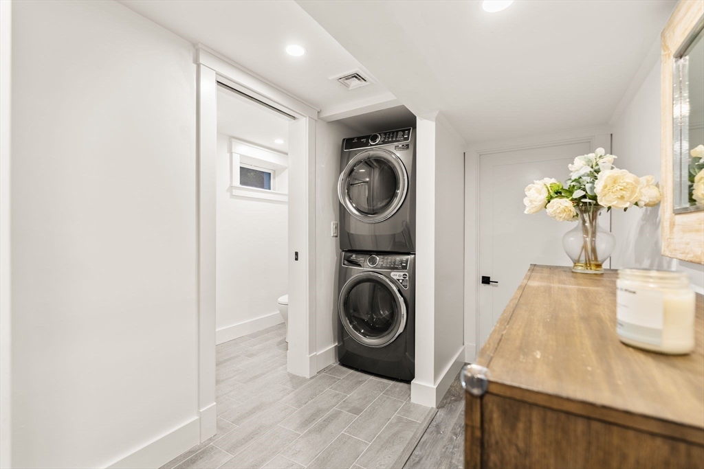 43 Oregon Road Ashland, MA 01721 - Photo 28 of 41 a view of a kitchen area with furniture and wooden floor