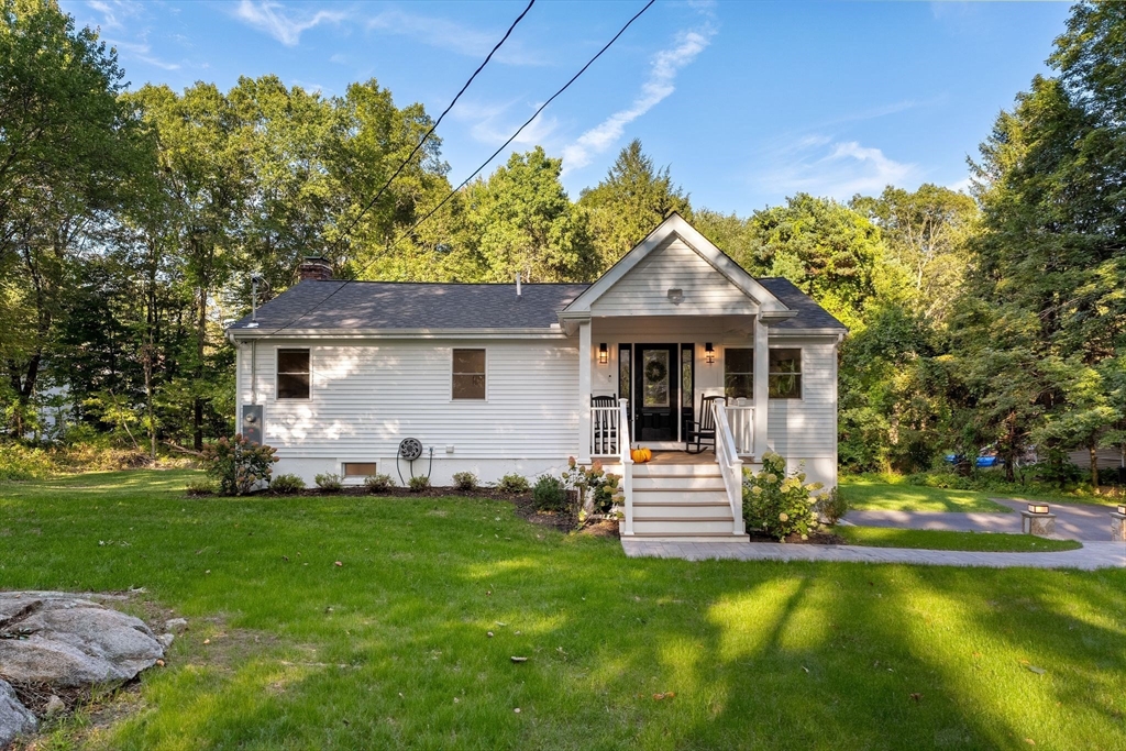 43 Oregon Road Ashland, MA 01721 - Photo 3 of 41 a front view of a house with a garden