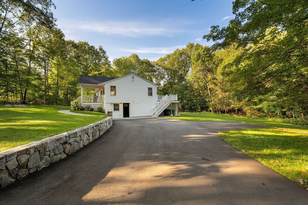 43 Oregon Road Ashland, MA 01721 - Photo 33 of 41 a view of a house with a yard