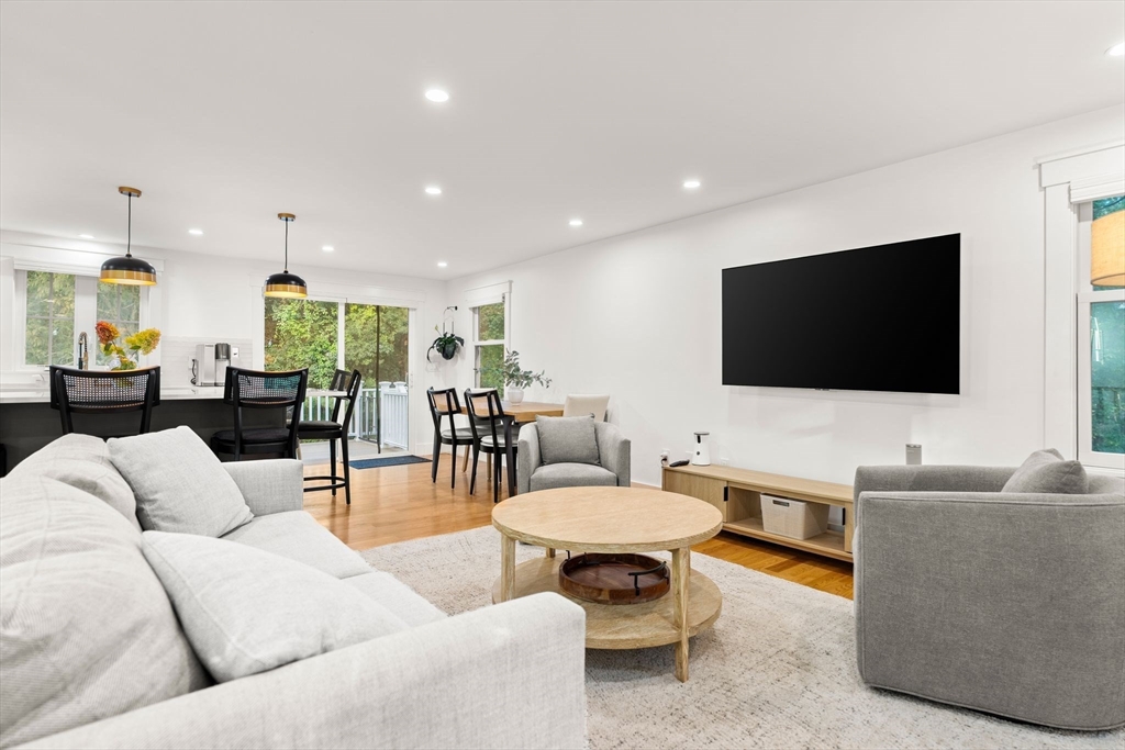 43 Oregon Road Ashland, MA 01721 - Photo 4 of 41 a living room with furniture and a flat screen tv