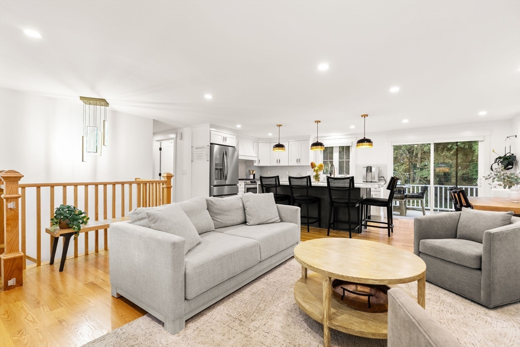 43 Oregon Road Ashland, MA 01721 - Photo 6 of 41 a living room with furniture and a table