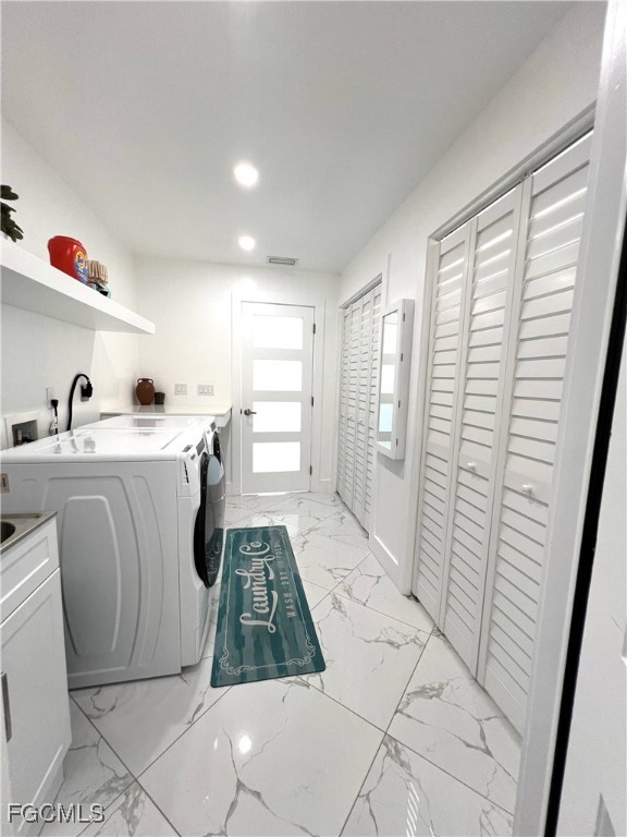 1919 Countess Court Naples, FL 34110 - Photo 25 of 30 a room with stainless steel appliances a rug stove and a window