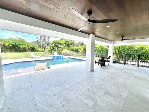 a view of a patio with a garden
